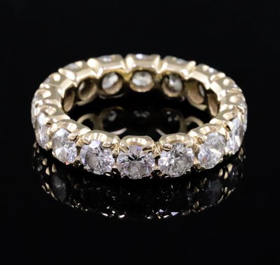 A gold and diamond full eternity ring, size K.